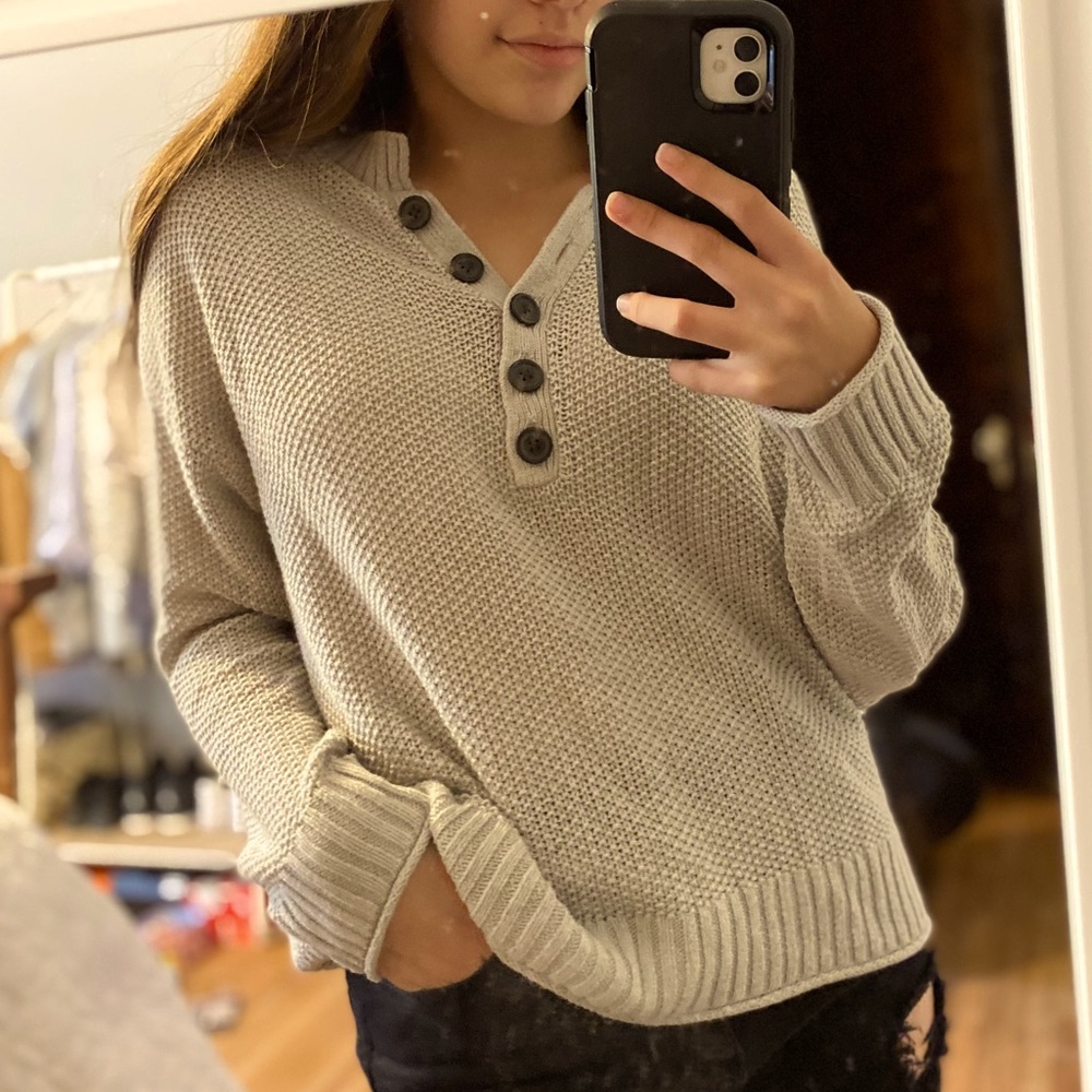 knit half-buttoned sweater